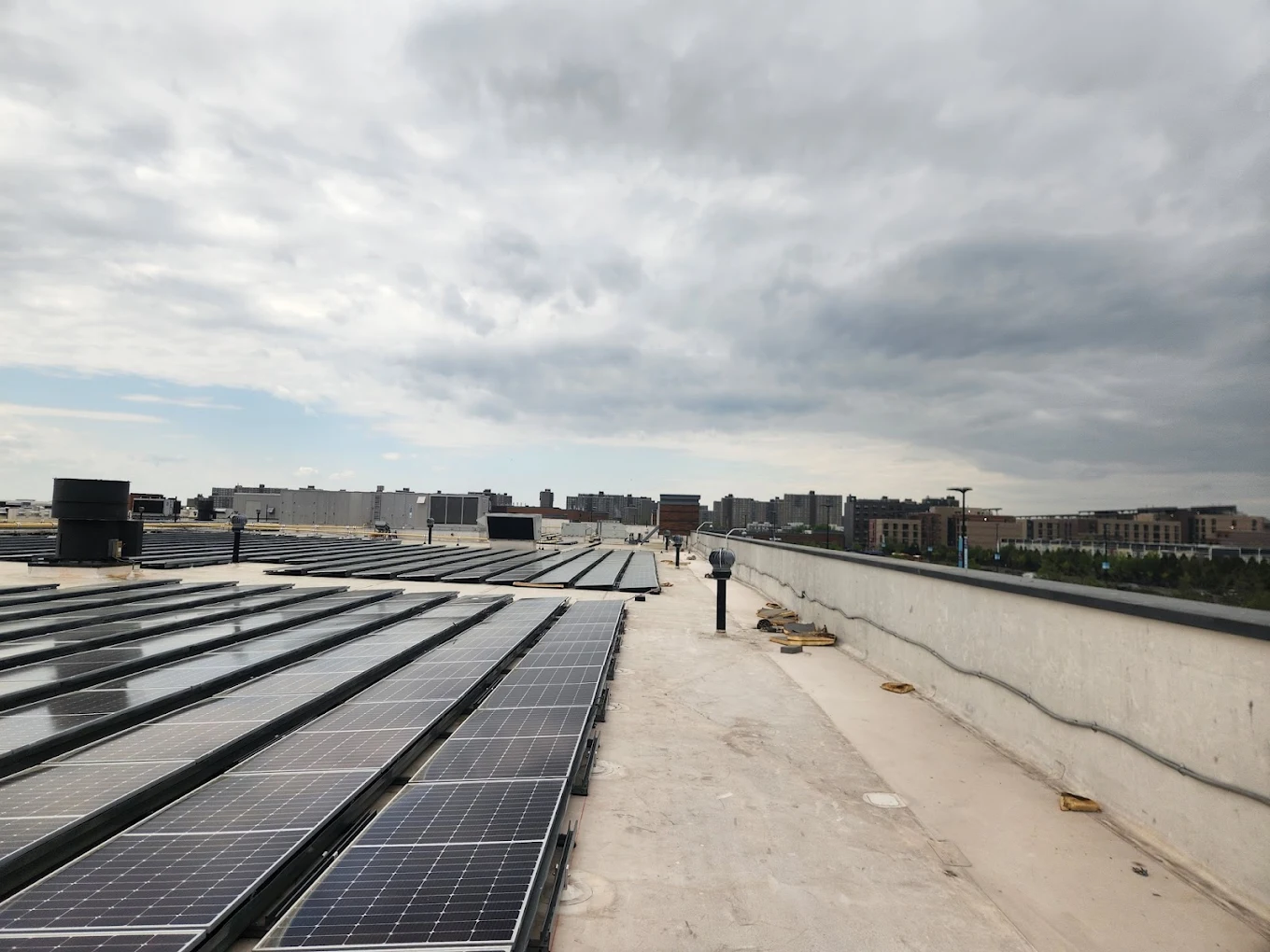 Roofing contractor in Amity Harbor NY — commercial flat roof installation on a waterfront commercial building