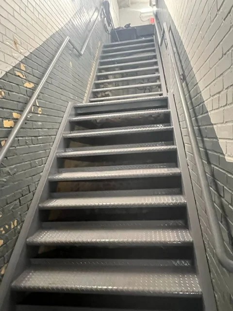 Steel fabricator in Brooklyn NY — iron works installation in East New York neighborhood commercial property