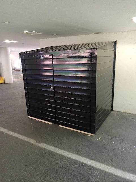 Site assessment for cellar door installation in Crown Heights Brooklyn — steel fabricator measuring sidewalk opening