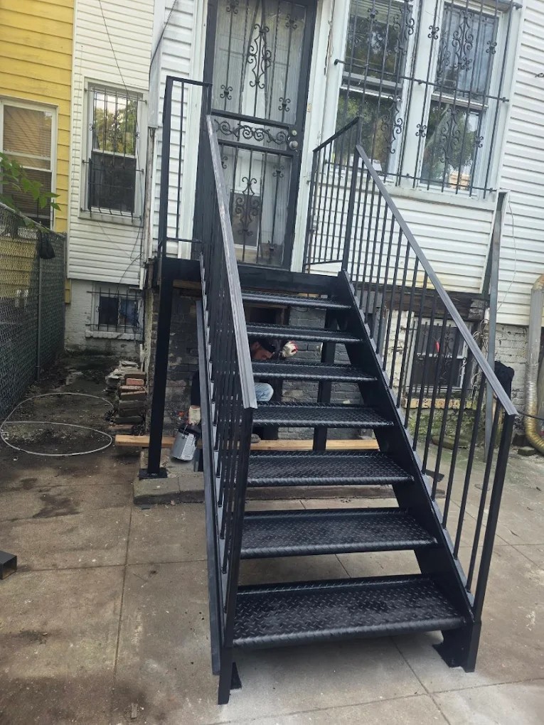 Economaster trash bin enclosure installation in East New York Brooklyn — commercial iron works on Atlantic Avenue